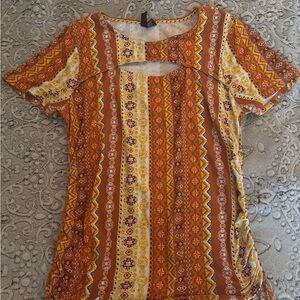orange and yellow boho top with cut out detail and scrunched tie sides. Size L